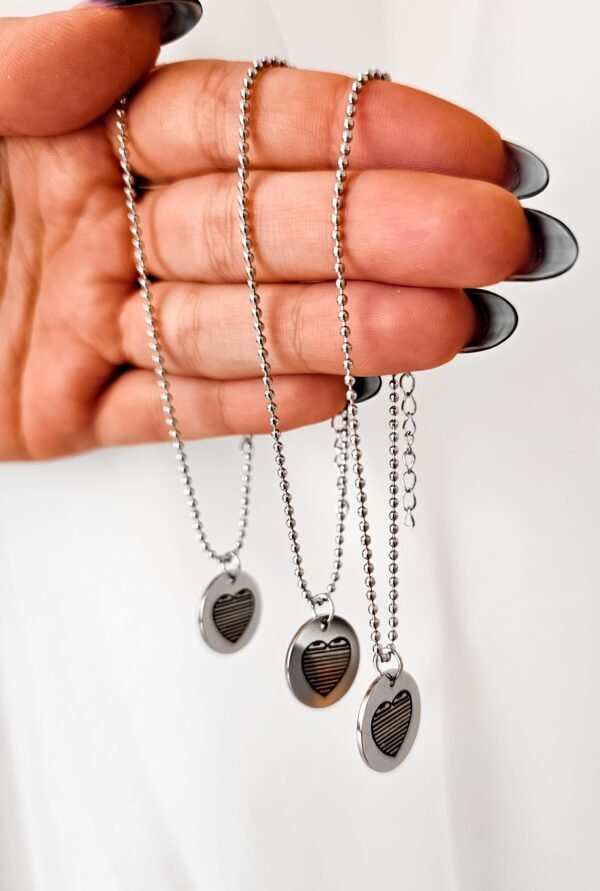 Pulsera balls corazón rayas