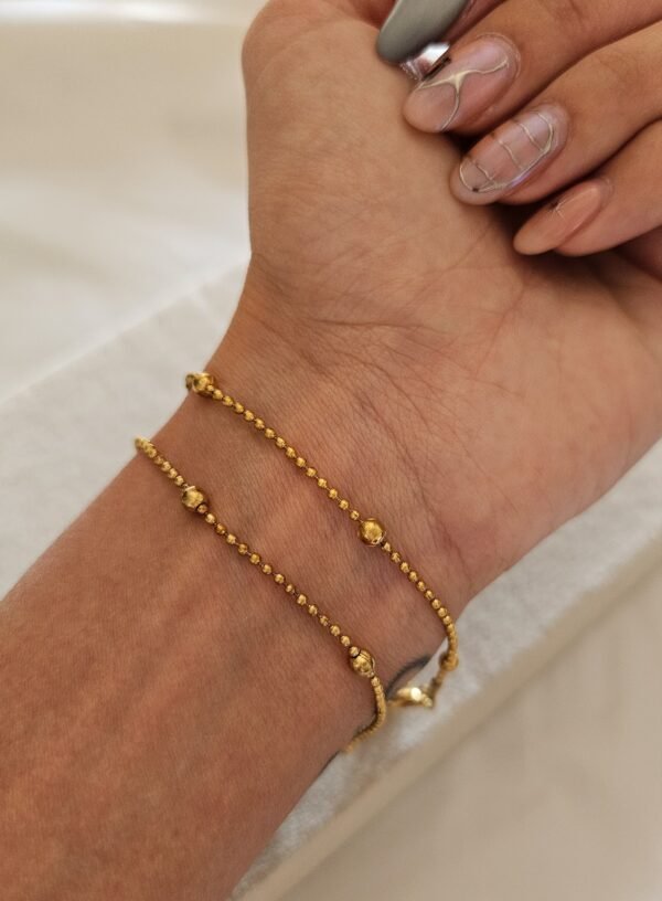 Pulsera full bolitas acero dorado