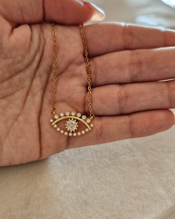 Collar eye shine acero dorado