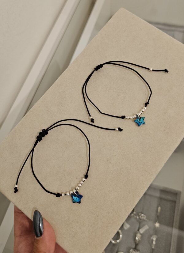 Pulsera hilo negro estrella tornasol