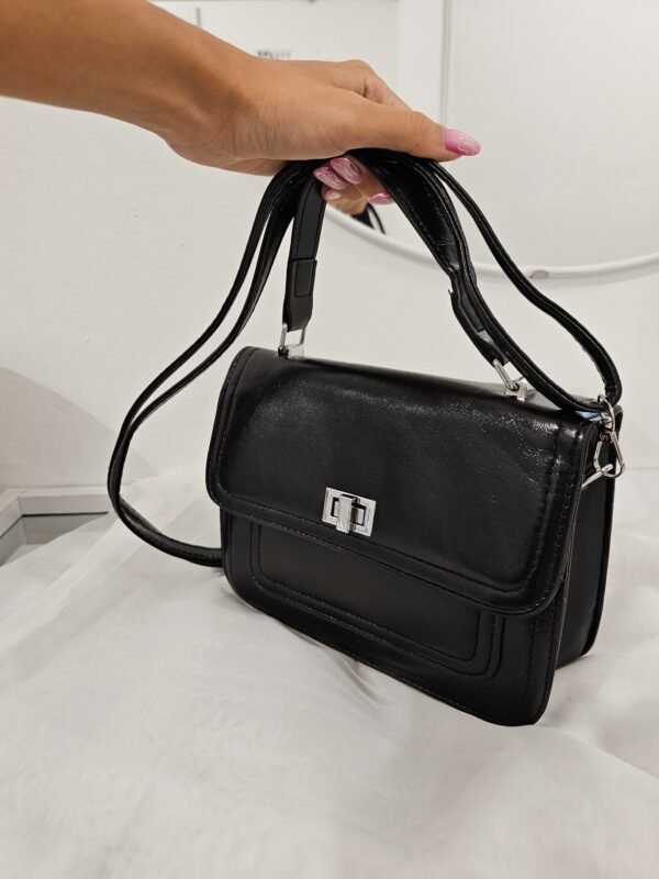 Cartera cierre plateado costuras