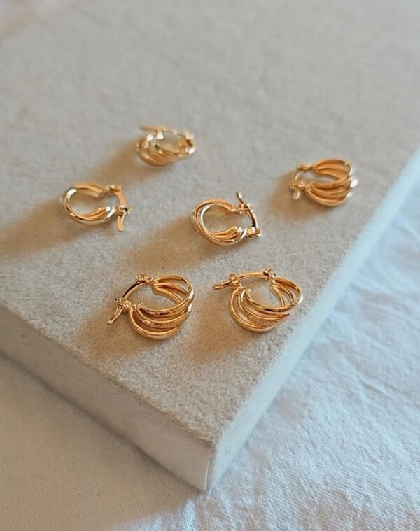 Argollitas triple textura acero dorado
