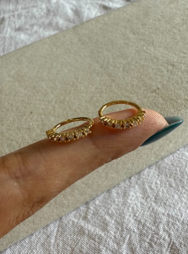 Piercing cristal max acero dorado
