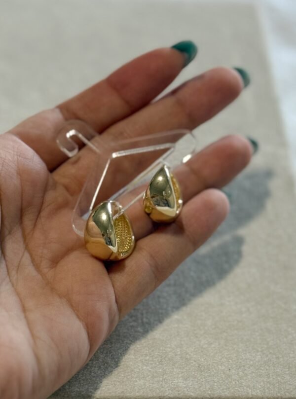 Argollas oval lisas chunky acero dorado