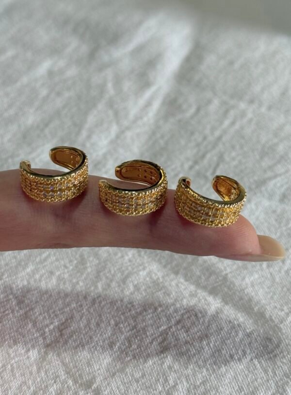 Cuff micropave acero dorado