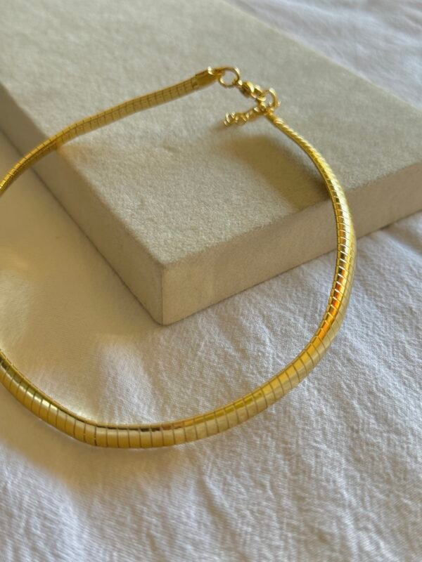 Collar plano acero dorado