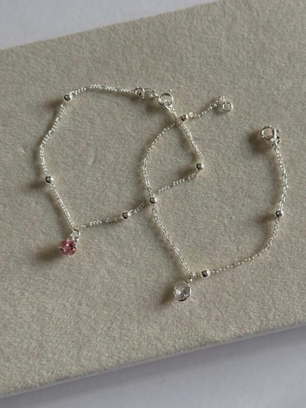 Pulsera bolitas brillo (2 colores)