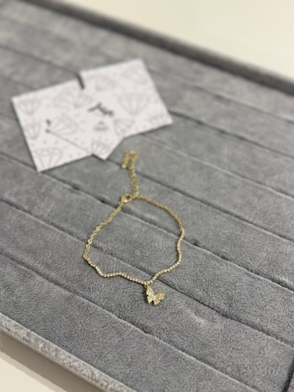 Pulsera ondas mariposa acero dorado