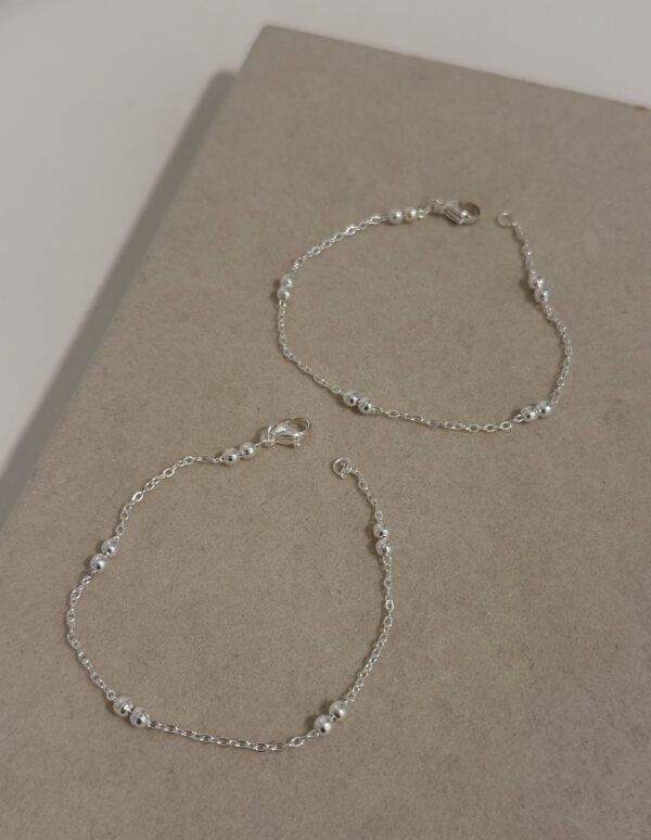 Pulsera lena doble acero blanco