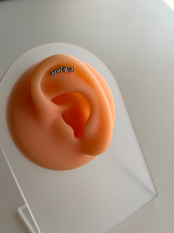 Piercing arcoiris love acero quirúrgico