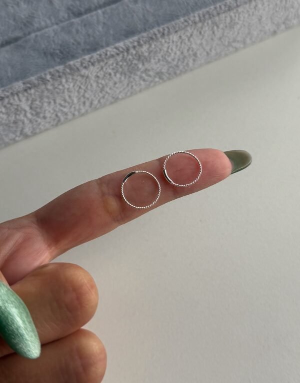 Piercing torzado traba