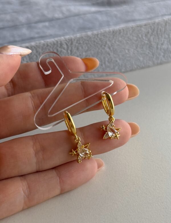 Argollitas estrellado acero dorado