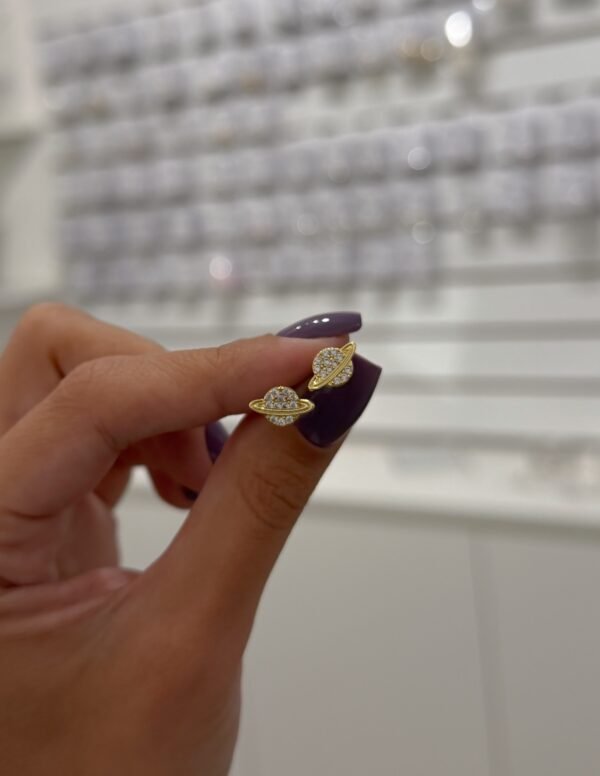 Miniaturas planeta shine acero dorado