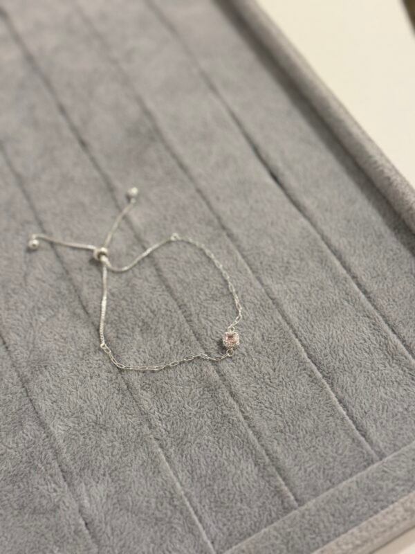 Pulsera ajustable cuadri rosa