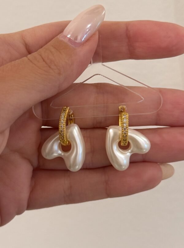 Argollas cora perla acero dorado