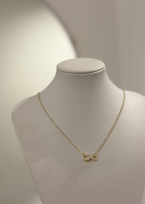 Collar infinito shine acero dorado