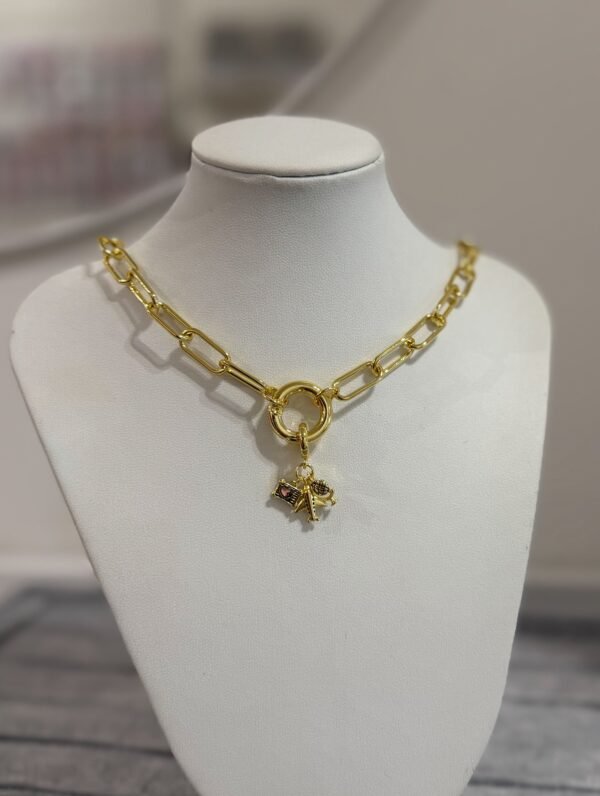 Collar travel acero dorado