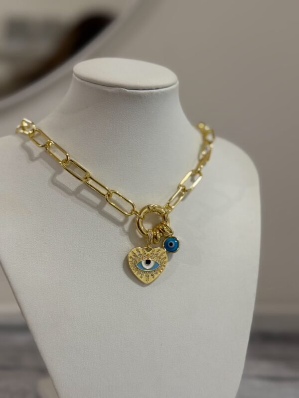 Collar amuleto acero dorado